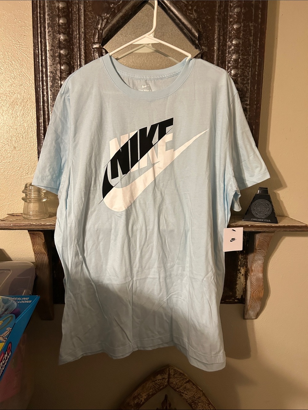 Nike Men’s Light Blue T-Shirt with Black & White Logo